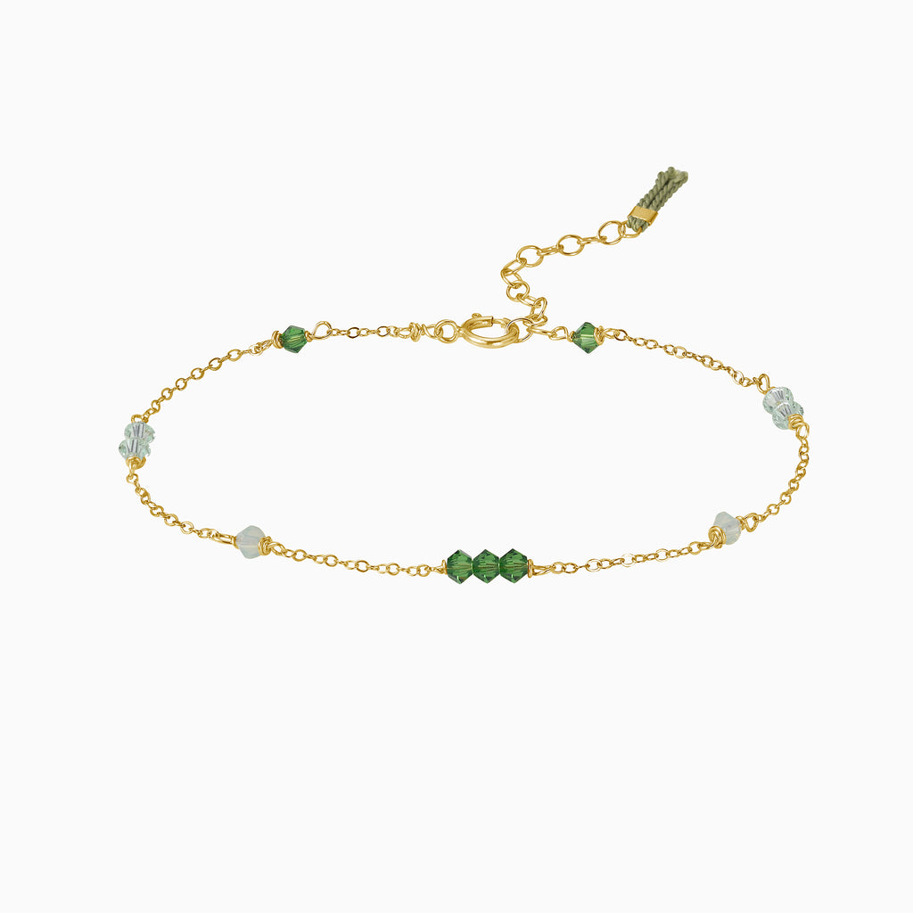  green crystals gold bracelet with tassel