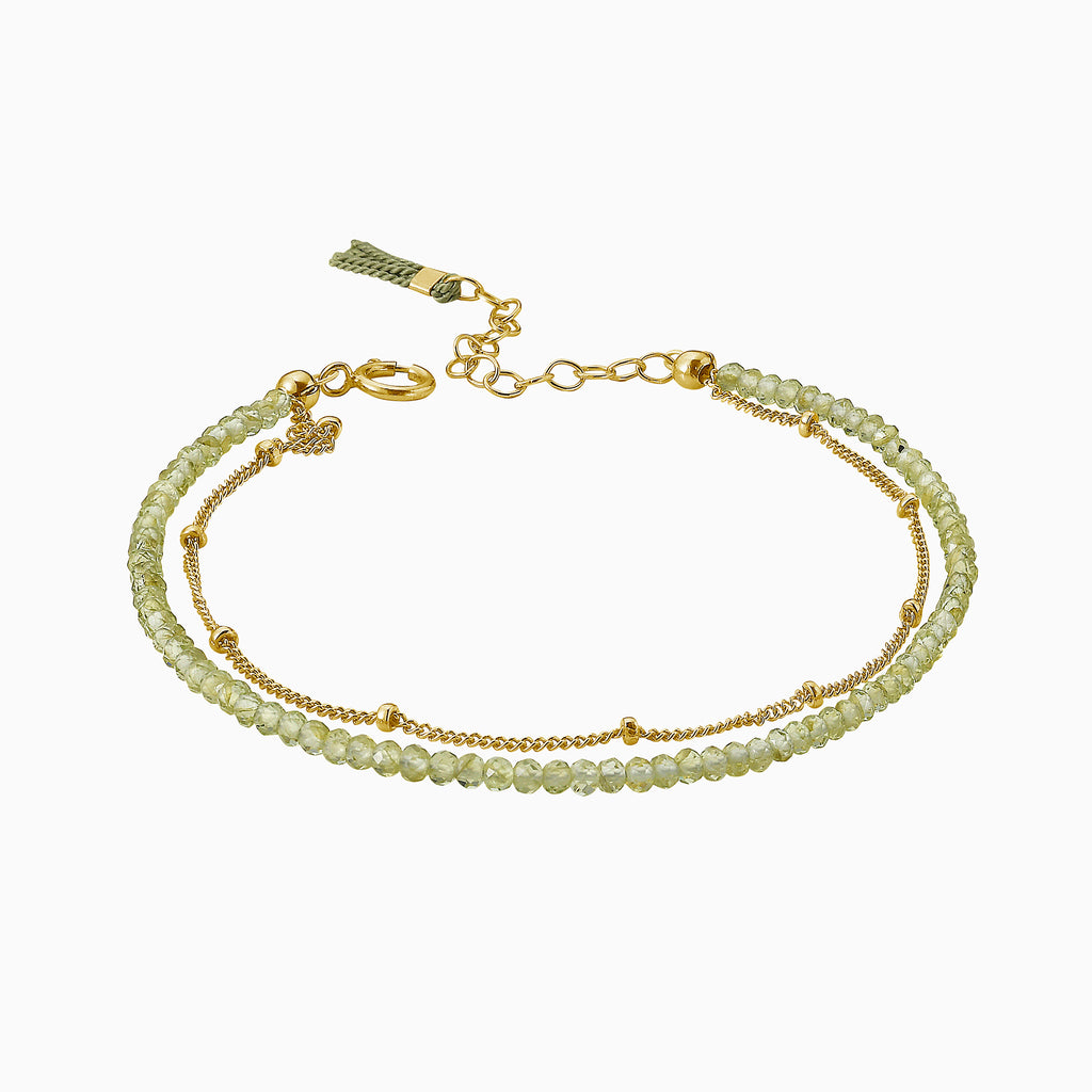 Peridot beads gold bracelet with tassel