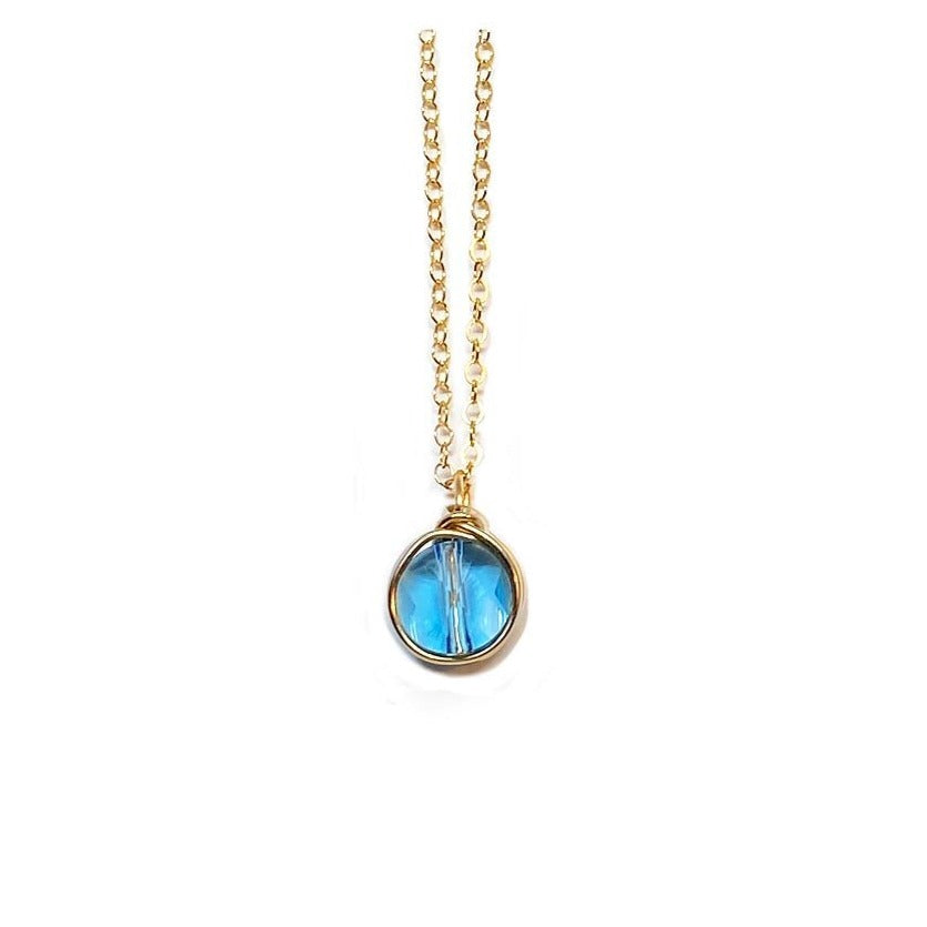 Mini aquamarine crystal circle pendant 