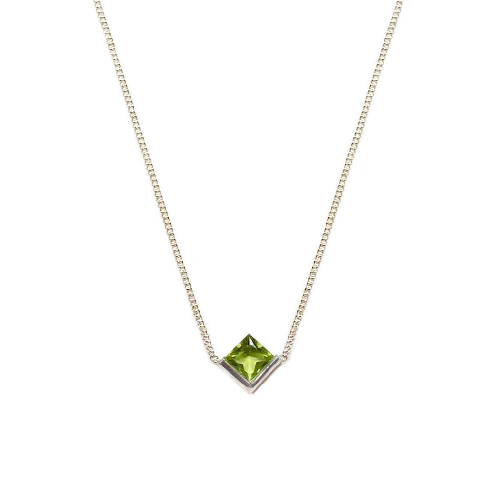 Peridot solitaire square silver necklace. Desideri design fine jewelry.